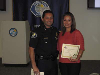 SAPD Chief Carlos Rojas with Santa Ana Mother