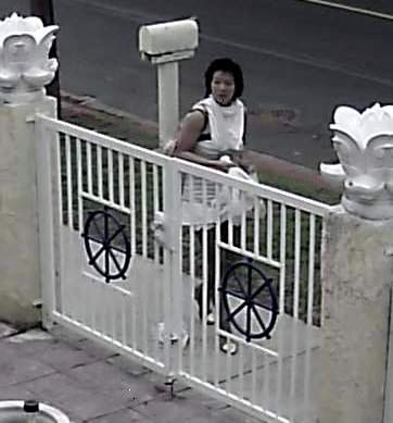 Woman in Santa Ana who throws glass bottles at Buddha