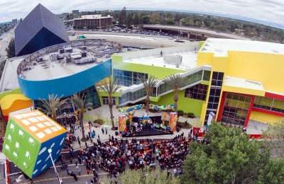 An aerial view of the over 300 attendees at the grand opening of Discovery Cube Orange County’s expansion and remodeled campus on Thursday, June 11 in Santa Ana, revealing new exhibits housed in the new 44,000 square-foot expansion featuring hands-on permanent exhibits, themed science adventures, interactive programs and STEM (science, technology, engineering and math) learning spaces to fuel children’s imaginations.