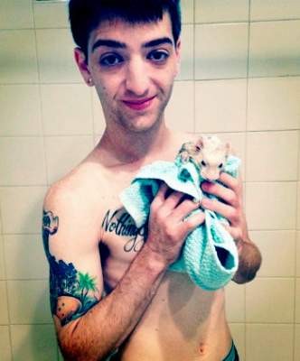 Sebastian Alexander-Bly Swisher and his ferret in the shower