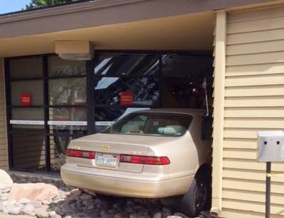 Elderly woman crashes into the Wells Fargo bank at 1801 E. 17th St.