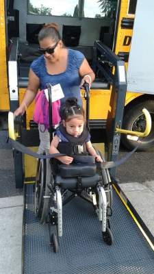 MIlagros in her wheelchair