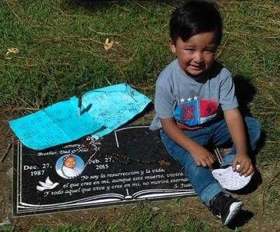 Ernesto Canepa's son at his grave