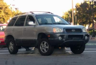 Vehicle stuck on the median at E. 3rd. and N. Spurgeon