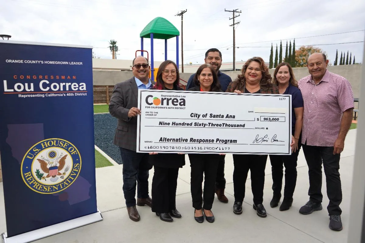 Lou Correa gives a big check to the City of Santa Ana