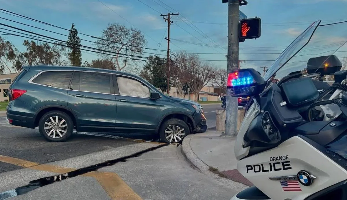 Woman arrested on DUI charges after colliding with a curb in Orange