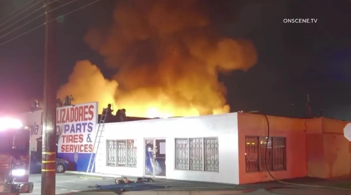 A fire at an auto shop in Santa Ana was stopped before it could spread to other businesses