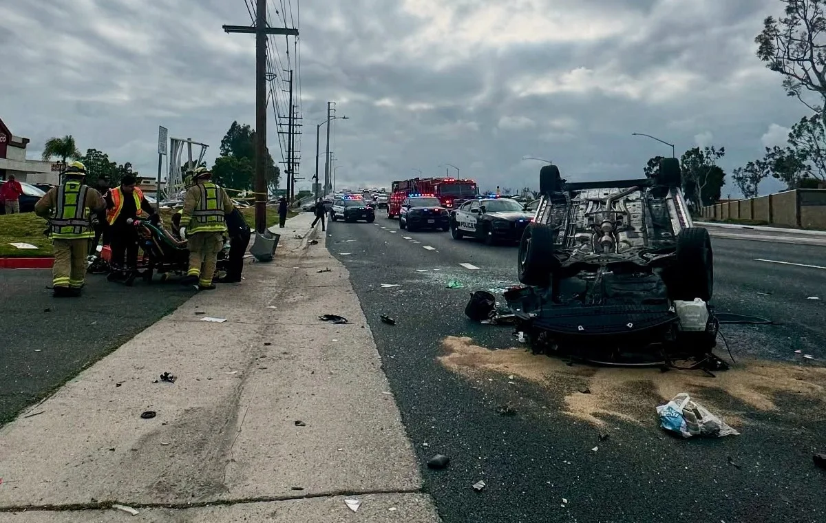 An OC driver is alive after flipping his car over when a curb was struck